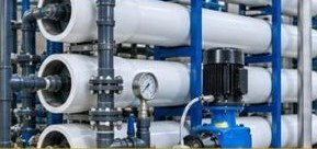 Industrial reverse osmosis plant with membrane pressure vessels, pumps and pressure gauges